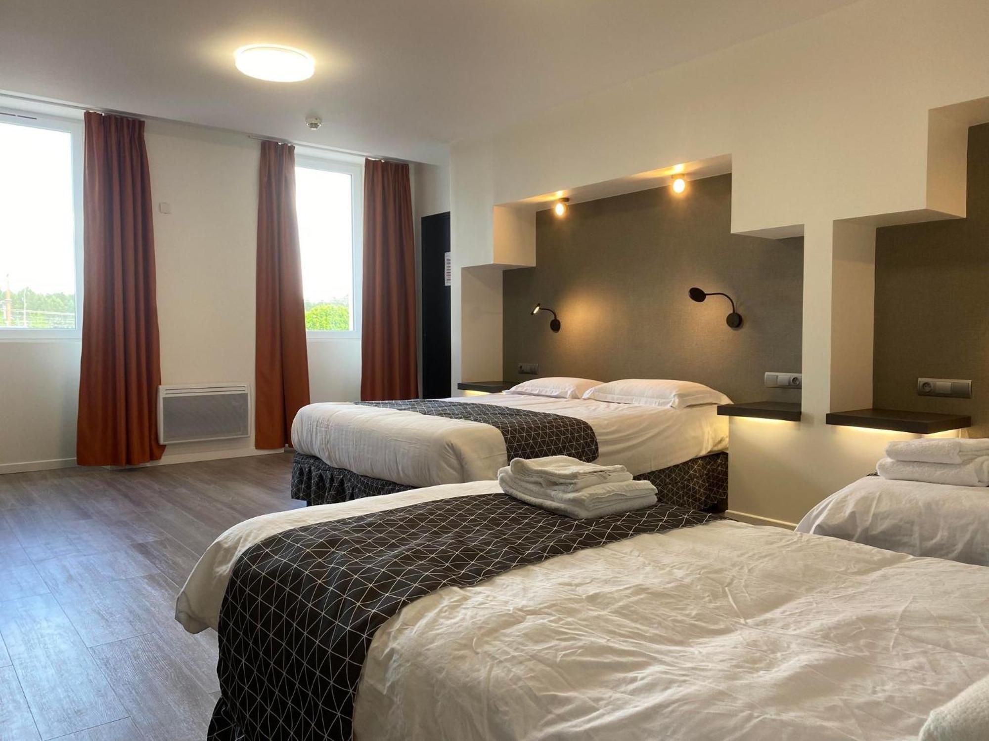 L'Aventure Hotell Morcenx Rum bild